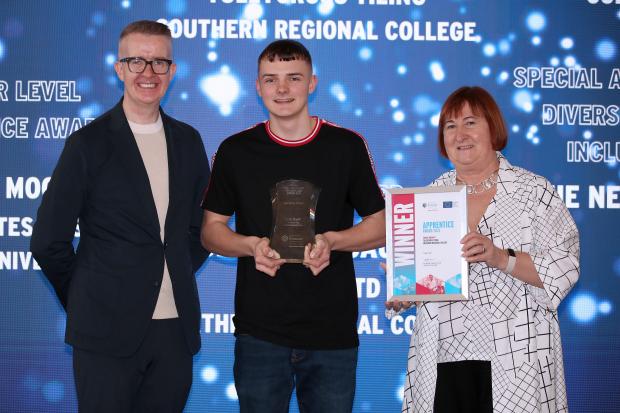 L to r: David Meade, event host, Conor Braniff, Apprentice of the Year winner, and Heather Cousins, Head of the Skills and Education Group at DfE