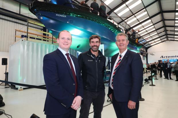 Economy Minister Gordon Lyons with DAERA Minister Edwin Poots and CEO of Artemis Technologies Dr Iain Percy OBE at the Artemis eFoiler Belfast Showcase.