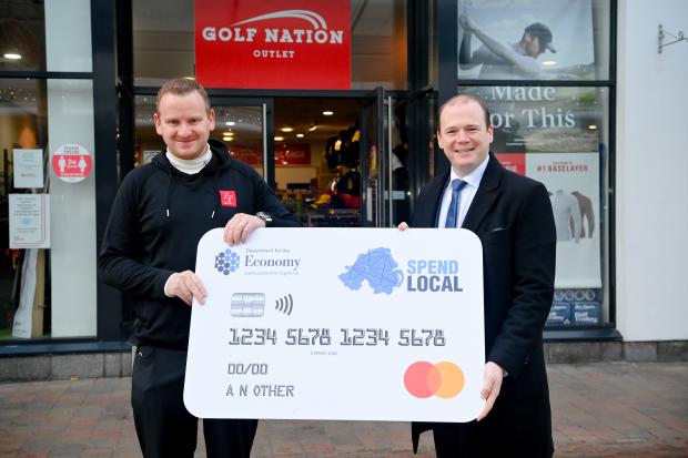 Economy Minister Gordon Lyons with David Millsopp, store manager of Golf Nation at the Junction Retail and Leisure Park in Antrim