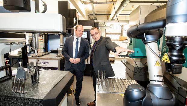 Economy Minister Gordon Lyons pictured with Rory Collins of the Northern Ireland Technology Centre at Queen's University Belfast.