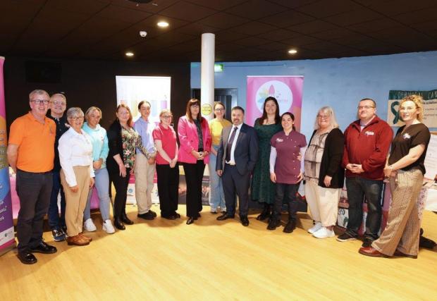 Minister Swann pictured with Staff and volunteers during his visit to Pink Ladies Cancer Support Group