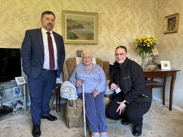 The Health Minister pictured with Ruth Crawford (aged 86) at her home in Belfast alongside her carer Julie-Anne Hosick from Connected Health