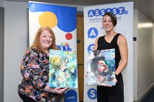 Justice Minister Naomi Long with Michelle Martin at Assist NI