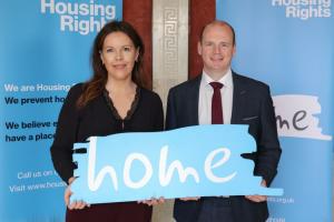 Communities Minister Gordon Lyons pictured with Housing Rights CEO Kate McCauley at Parliament Buildings